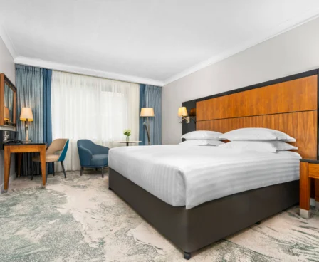 Elegant hotel room with cosy bed and modern furnishings at The Galmont Hotel & Spa.