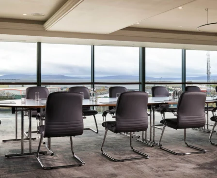 Spacious meeting room at The Galmont Hotel with a scenic view of the city.
