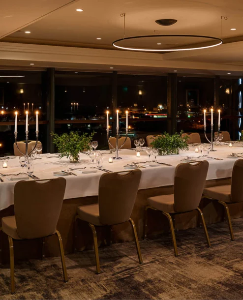 Elegant dining room set for a gathering at The Galmont Hotel & Spa.