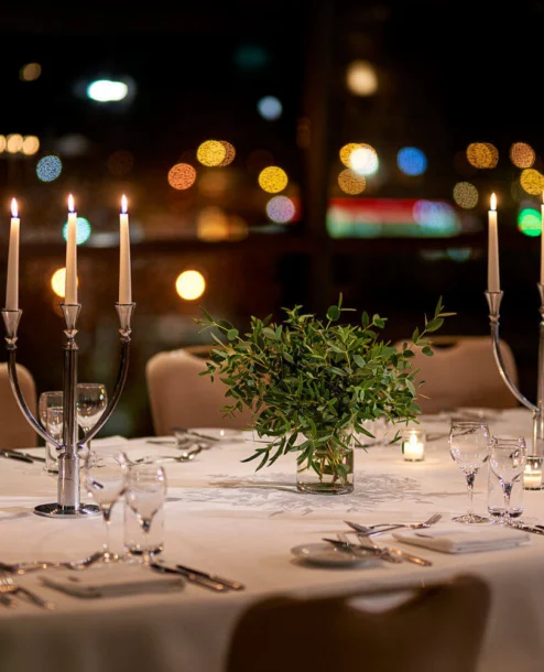 Elegant dinner table setup with candles and greenery at The Galmont Hotel & Spa.