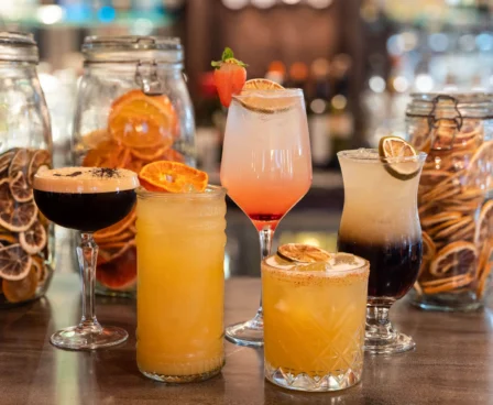 A display of colourful cocktails at The Galmont Hotel & Spa bar. Visible dried citrus garnishes.