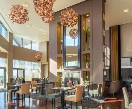 Spacious lounge with elegant decor and large windows in The Galmont Hotel & Spa.