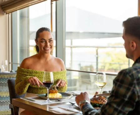 Couple enjoying wine and dinner with a scenic view at The Galmont Hotel.