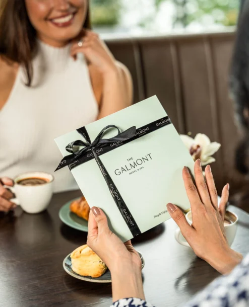 A couple enjoying coffee and pastries at The Galmont Hotel & Spa.