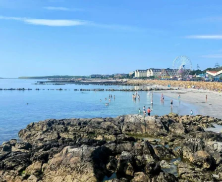 Families enjoying a sunny day at the beach near The Galmont Hotel & Spa in Ireland.
